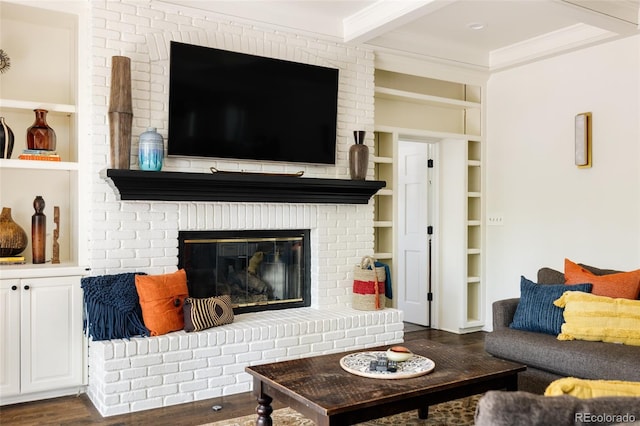 301 Fairfax St, Denver, CO 80220 - living room featuring wood finished floors, a brick fireplace, built in shelves, ornamental molding, and beamed ceiling