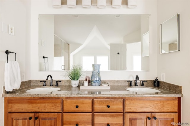 301 Fairfax St, Denver, CO 80220 - bathroom featuring double vanity and a stall shower