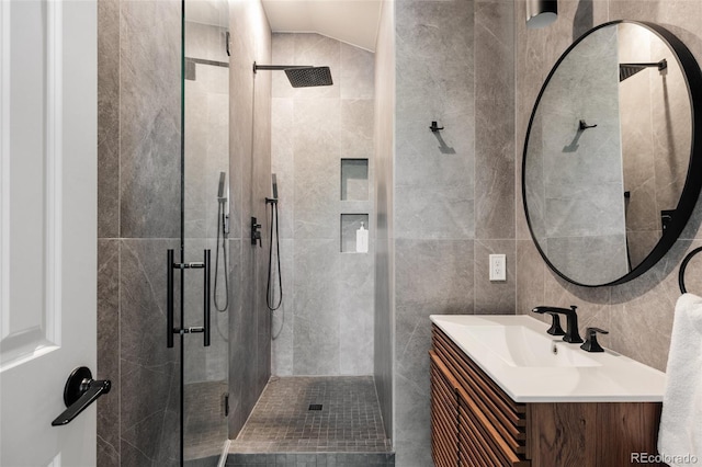 301 Fairfax St, Denver, CO 80220 - full bath featuring tile walls, a stall shower, and vanity