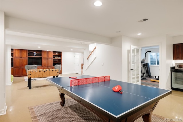 301 Fairfax St, Denver, CO 80220 - playroom with recessed lighting, baseboards, and beverage cooler