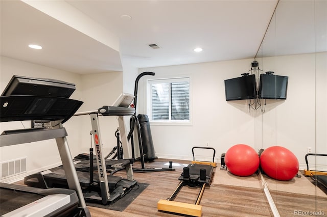 301 Fairfax St, Denver, CO 80220 - workout room featuring baseboards, wood finished floors, and recessed lighting