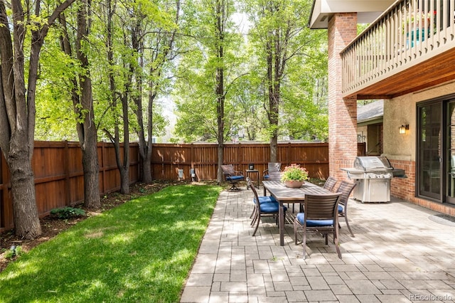 301 Fairfax St, Denver, CO 80220 - view of patio featuring grilling area and outdoor dining space