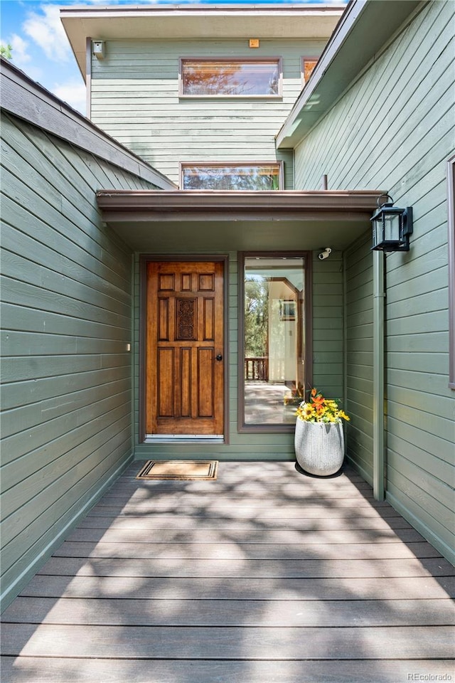 4515 Red Rock Dr, Larkspur, CO 80118 - property entrance with a deck