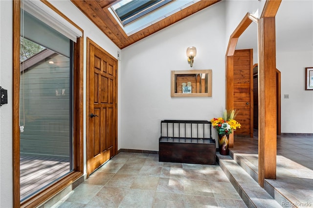 4515 Red Rock Dr, Larkspur, CO 80118 - entryway with a skylight, vaulted ceiling, baseboards, and a relaxing sauna