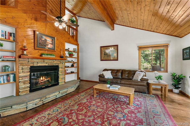 4515 Red Rock Dr, Larkspur, CO 80118 - living area with a ceiling fan, baseboards, wooden ceiling, a fireplace, and wood finished floors