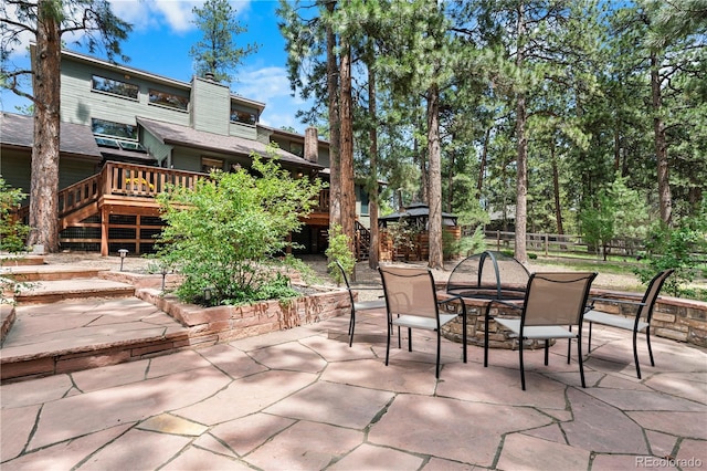 4515 Red Rock Dr, Larkspur, CO 80118 - view of patio featuring stairs, an outdoor fire pit, and a wooden deck
