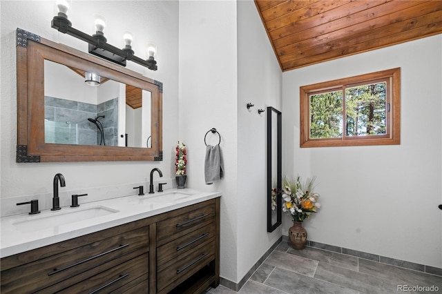 4515 Red Rock Dr, Larkspur, CO 80118 - full bath with double vanity, baseboards, a tile shower, lofted ceiling, and wood ceiling