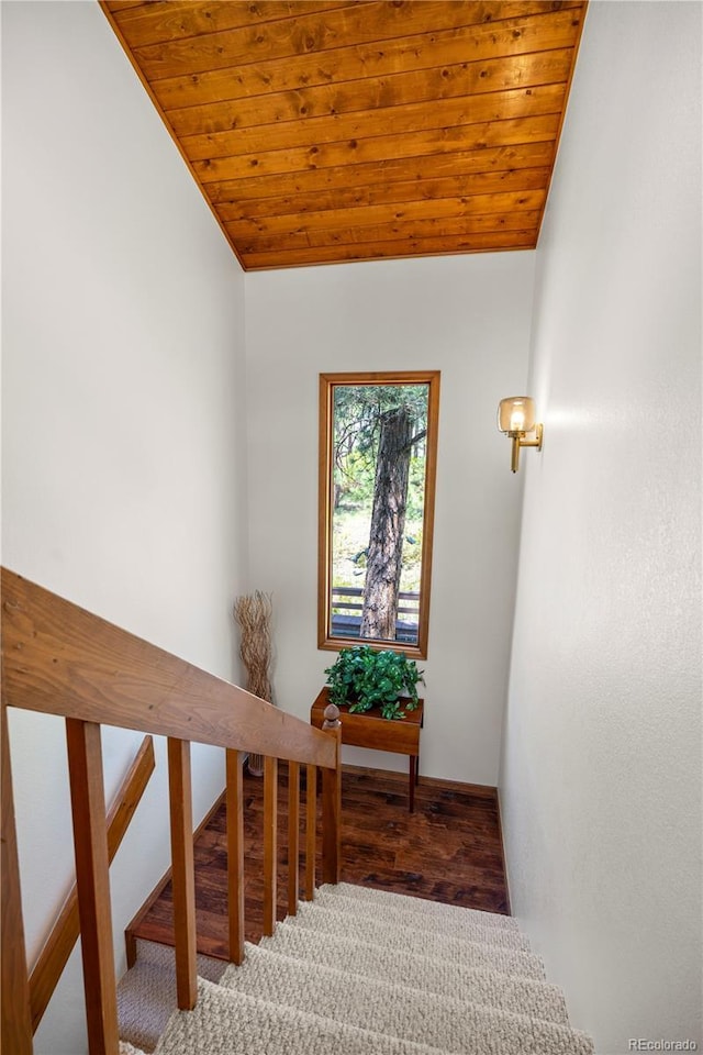 4515 Red Rock Dr, Larkspur, CO 80118 - stairway with wood ceiling, baseboards, vaulted ceiling, and wood finished floors