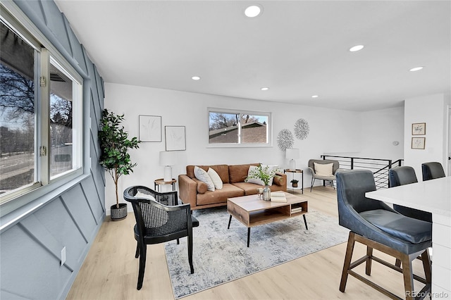 living room with light hardwood / wood-style flooring