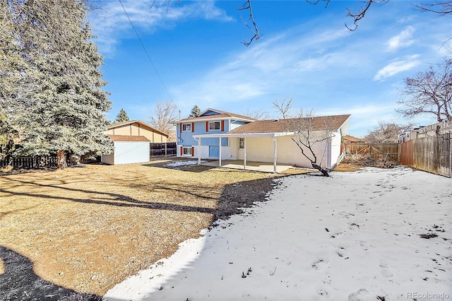 view of front of home with a patio area