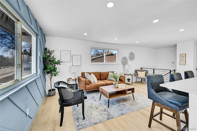 living room with light hardwood / wood-style flooring