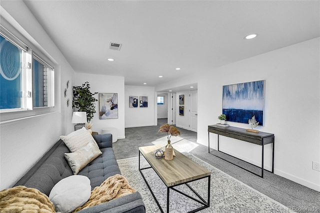 living room featuring light colored carpet