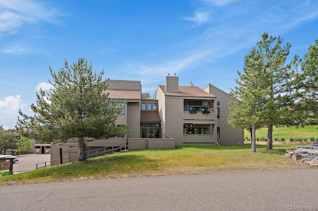 23712 Pondview Pl Unit A, Golden, CO 80401 - back of property featuring a chimney