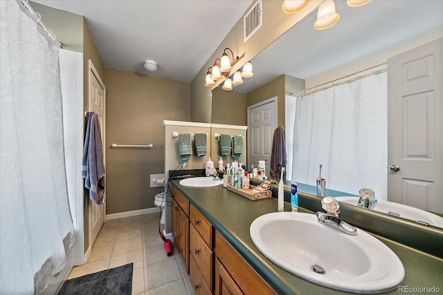 23712 Pondview Pl Unit A, Golden, CO 80401 - full bath with double vanity, tile patterned floors, and a shower with shower curtain