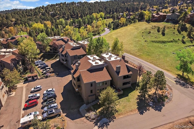 23712 Pondview Pl Unit A, Golden, CO 80401 - aerial view of residential area with a heavily wooded area
