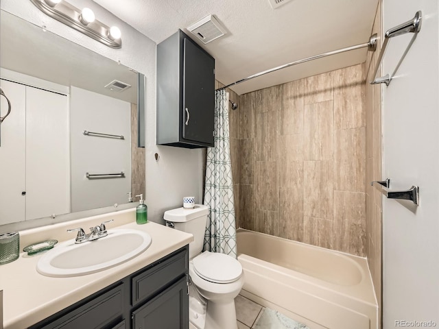 full bath with toilet, shower / bath combo with shower curtain, vanity, tile patterned floors, and a textured ceiling