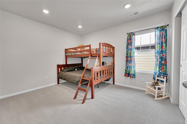 bedroom with visible vents, recessed lighting, carpet flooring, and baseboards