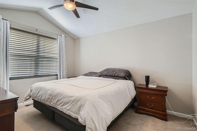 bedroom with carpet, ceiling fan, and lofted ceiling