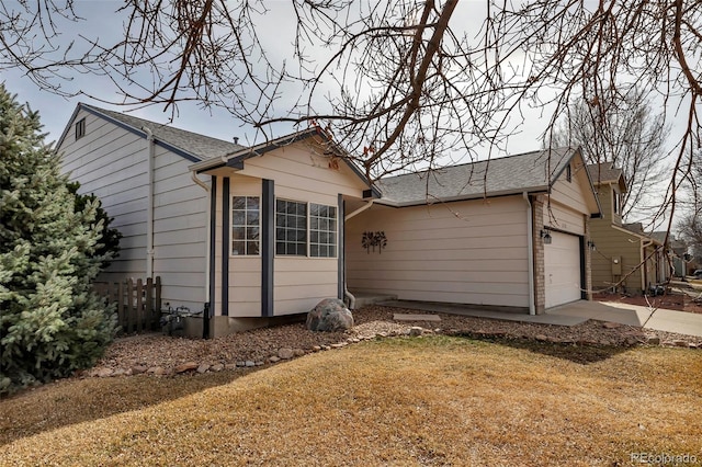 2132 Boise Ct, Longmont, CO 80504 - exterior space with an attached garage and a shingled roof
