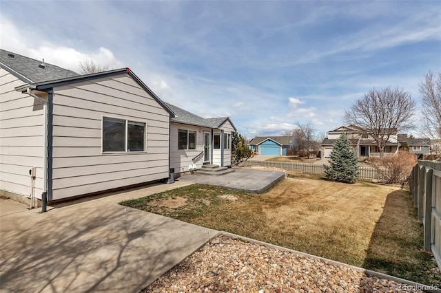 2132 Boise Ct, Longmont, CO 80504 - view of side of property with entry steps and a patio