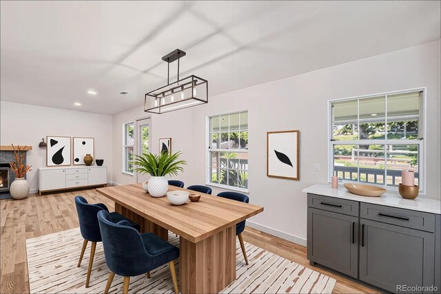 9948 King St, Westminster, CO 80031 - dining space with light wood-style flooring and recessed lighting