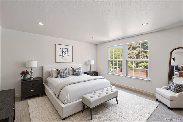 9948 King St, Westminster, CO 80031 - bedroom with light colored carpet, recessed lighting, and a textured ceiling
