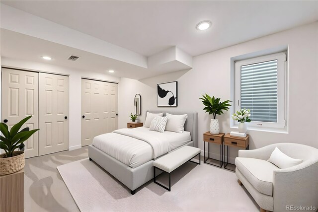 9948 King St, Westminster, CO 80031 - bedroom featuring two closets and recessed lighting
