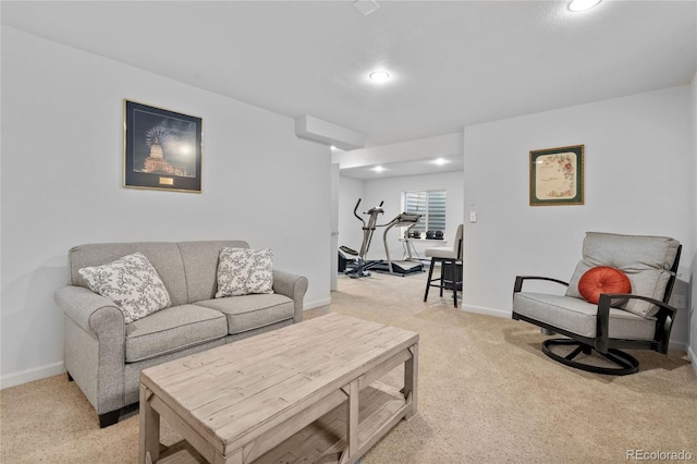 living room featuring light carpet