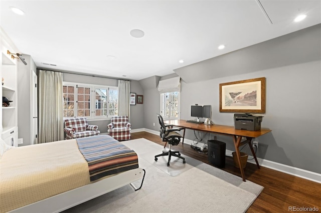 bedroom with recessed lighting, lofted ceiling, baseboards, and wood finished floors