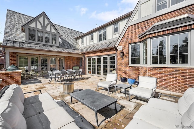 view of patio / terrace featuring french doors and outdoor lounge area