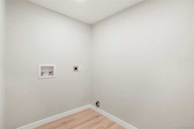 4682 Chatham St, Boulder, CO 80301 - laundry area with hookup for an electric dryer, baseboards, light wood-type flooring, and washer hookup