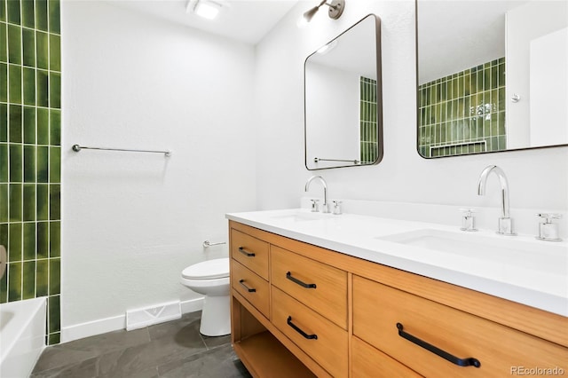 4682 Chatham St, Boulder, CO 80301 - full bath featuring double vanity, toilet, baseboards, and tile patterned floors