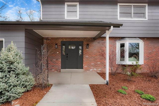 4682 Chatham St, Boulder, CO 80301 - doorway to property with brick siding and a porch