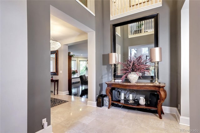 entryway featuring a high ceiling