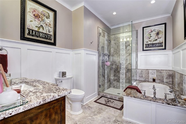 full bathroom with toilet, vanity, and separate shower and tub