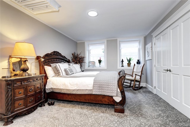 bedroom with crown molding