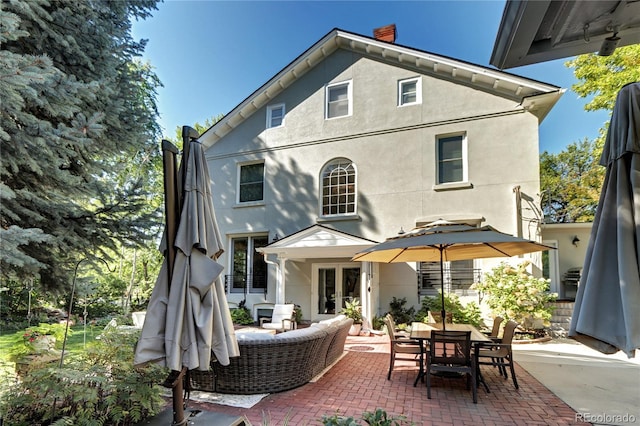 rear view of house with a patio area