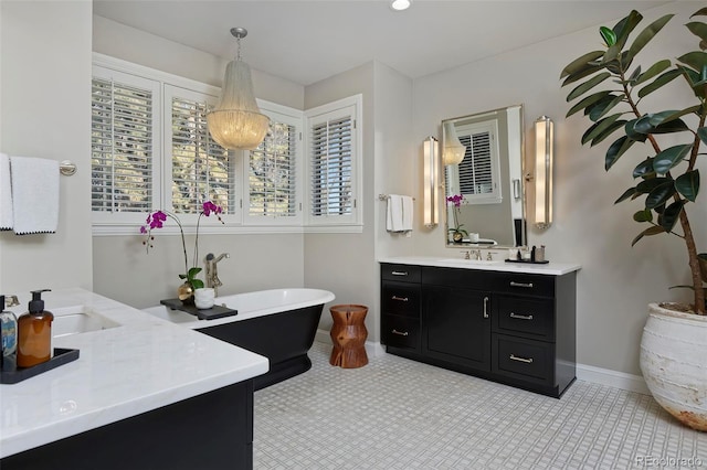 bathroom featuring vanity and a bathtub