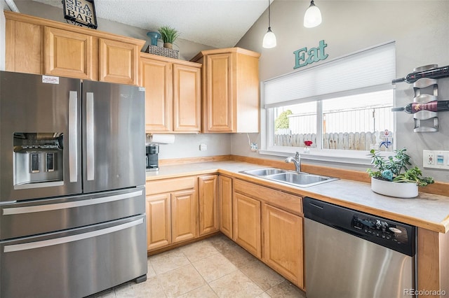 8893 W Ontario Ave, Littleton, CO 80128 - kitchen with a sink, light tile patterned floors, light countertops, and appliances with stainless steel finishes