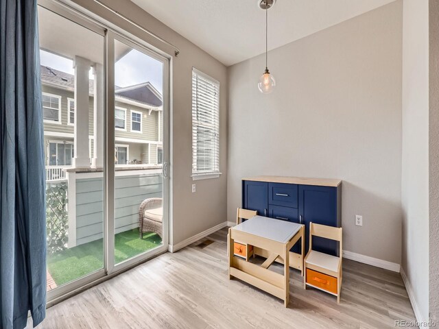 9363 Amison Cir Unit 106, Parker, CO 80134 - dining space with light wood-style floors and baseboards