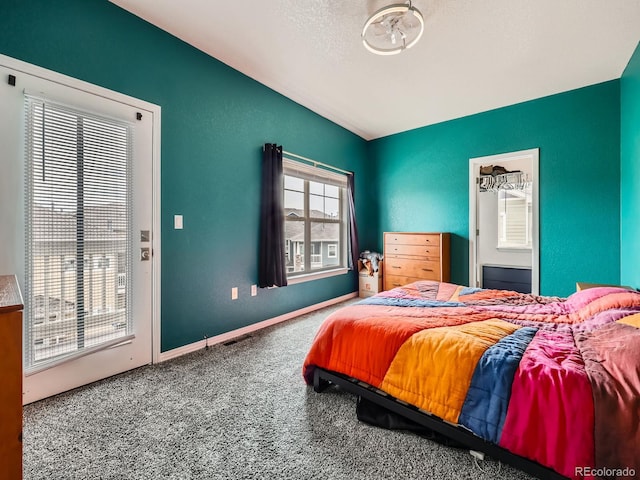 9363 Amison Cir Unit 106, Parker, CO 80134 - bedroom featuring carpet and baseboards