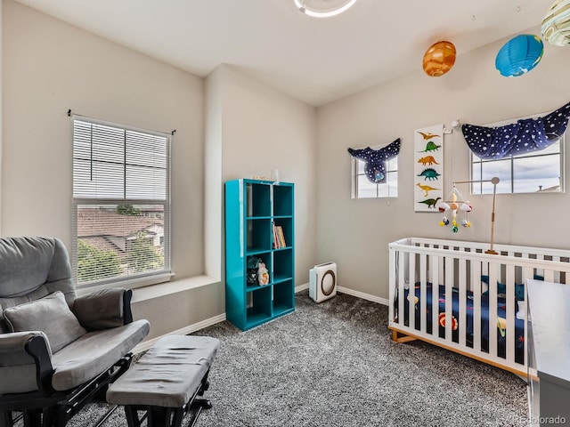 9363 Amison Cir Unit 106, Parker, CO 80134 - carpeted bedroom featuring multiple windows, baseboards, and a crib