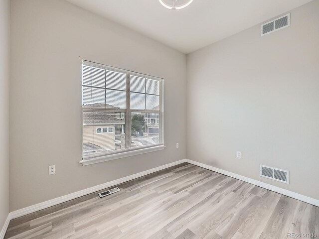 9363 Amison Cir Unit 106, Parker, CO 80134 - empty room featuring wood finished floors and baseboards