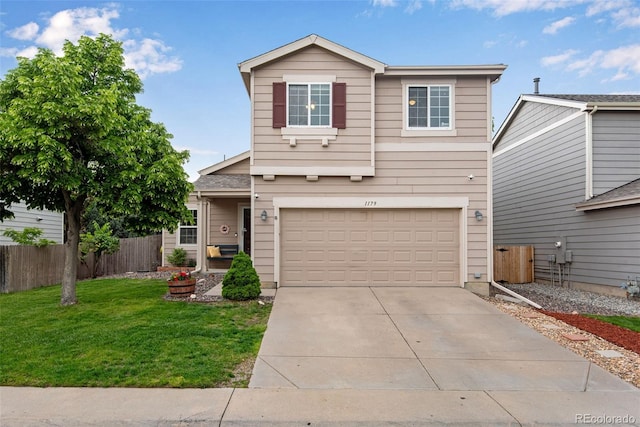 1179 S Alton Ct, Denver, CO 80247 - traditional-style house featuring a garage and driveway