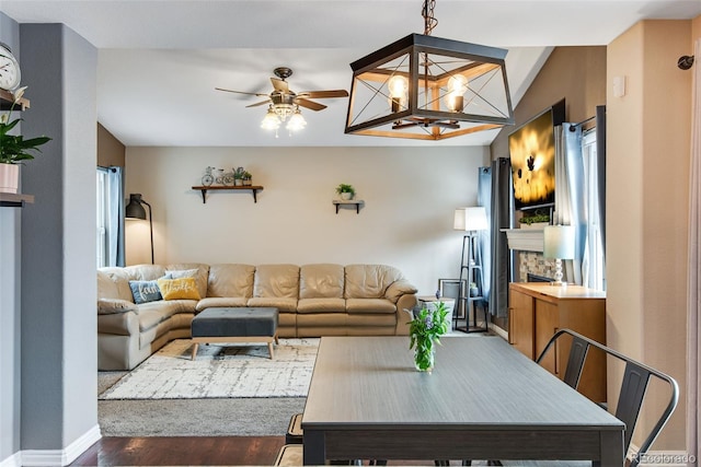 1179 S Alton Ct, Denver, CO 80247 - living room with wood finished floors, baseboards, and a ceiling fan
