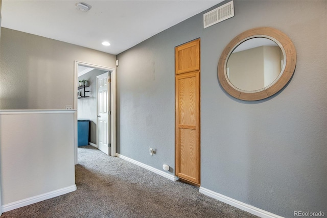 1179 S Alton Ct, Denver, CO 80247 - hall with carpet floors, an upstairs landing, and baseboards