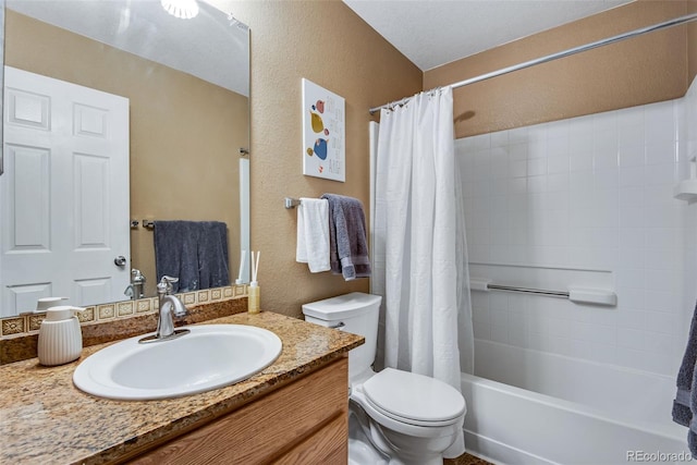 1179 S Alton Ct, Denver, CO 80247 - full bath with toilet, vanity, a textured wall, and shower / tub combo