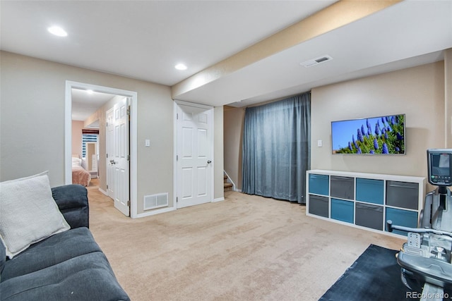 1179 S Alton Ct, Denver, CO 80247 - living room with light colored carpet, stairs, recessed lighting, and baseboards