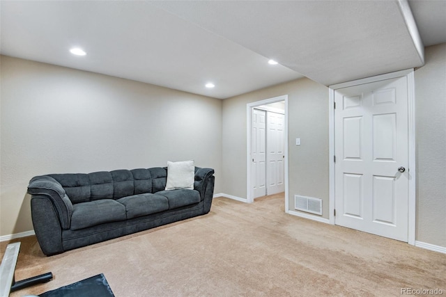 1179 S Alton Ct, Denver, CO 80247 - carpeted living room featuring baseboards and recessed lighting
