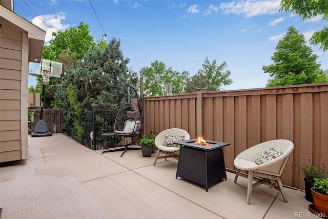 1179 S Alton Ct, Denver, CO 80247 - fenced backyard with a patio area and an outdoor fire pit